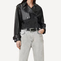Back view of cropped black leather trench jacket for women