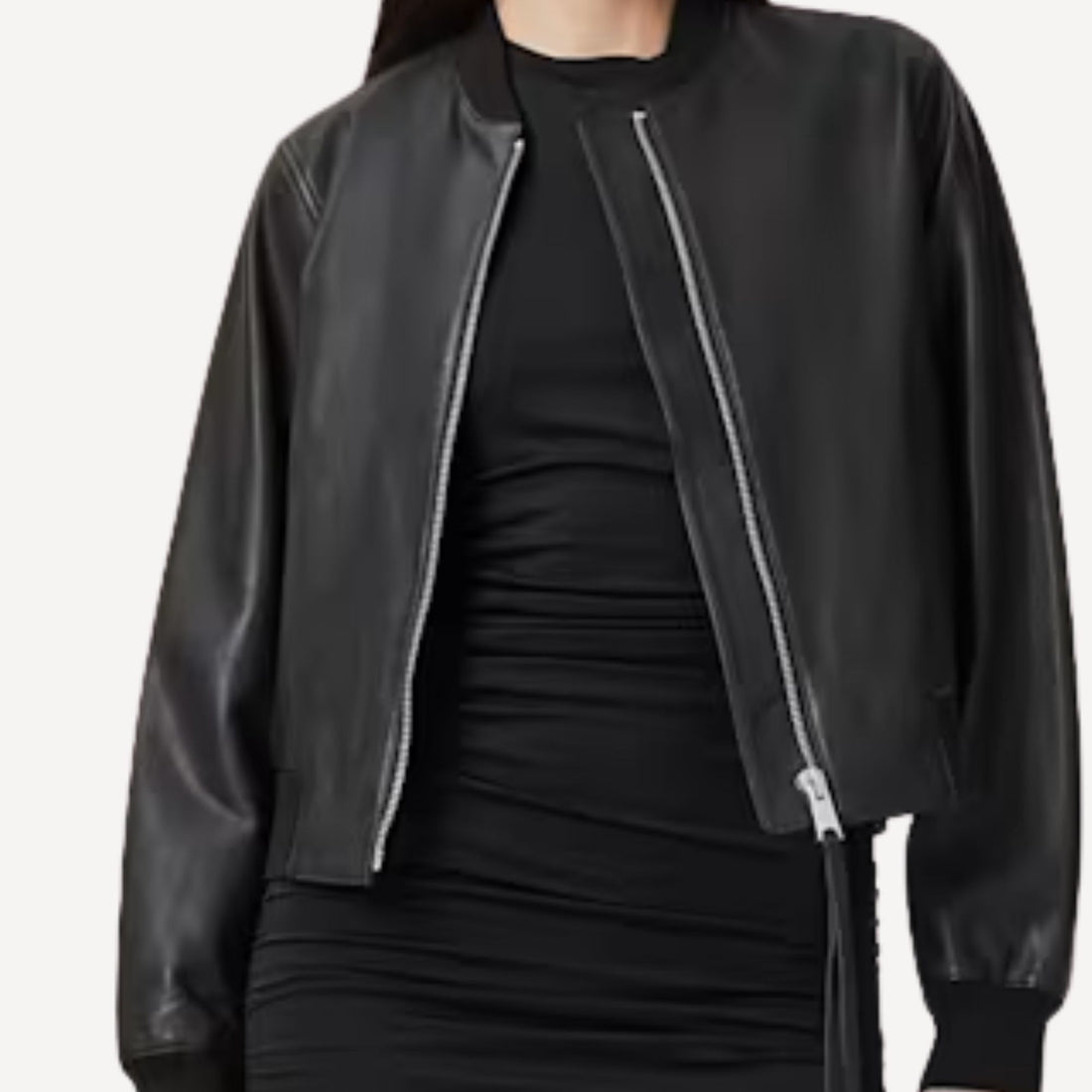 Ladies black leather bomber jacket for fashion and street style.