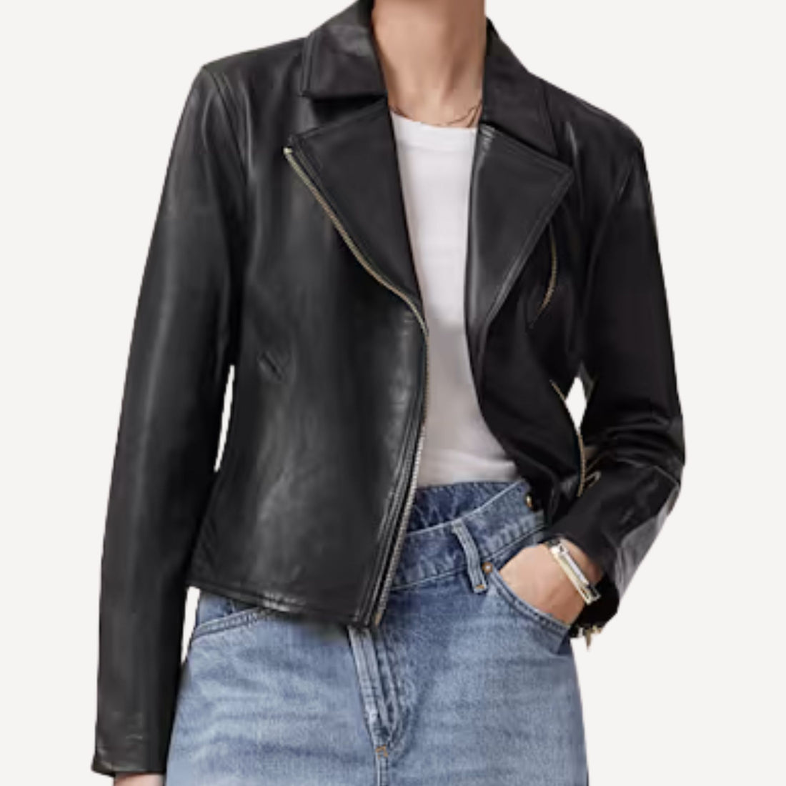 Black cropped leather jacket featuring tailored silhouette.