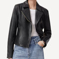Black cropped leather jacket featuring tailored silhouette.