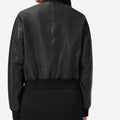 Tailored black bomber leather jacket with ribbed cuffs and hem.