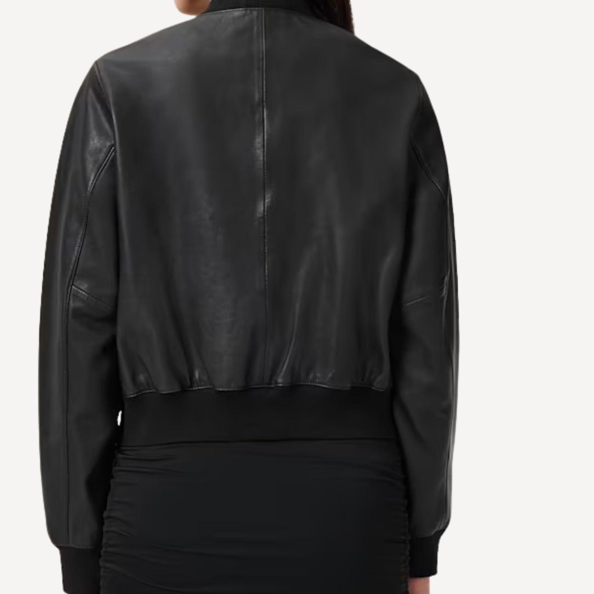 Tailored black bomber leather jacket with ribbed cuffs and hem.