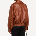 Vintage-style brown leather jacket for women in oversized design