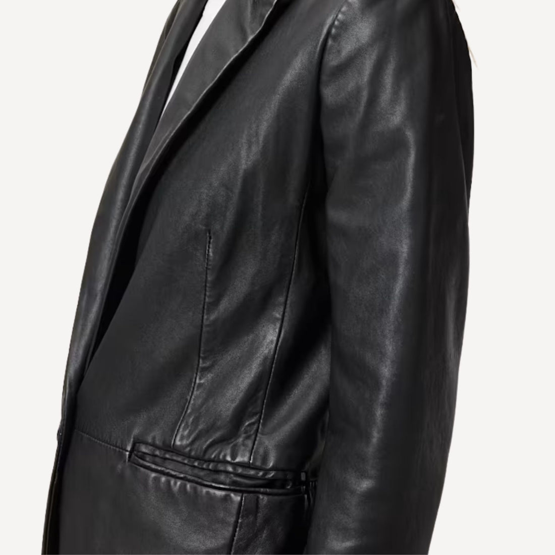 Women’s black leather blazer jacket with modern tailored fit.