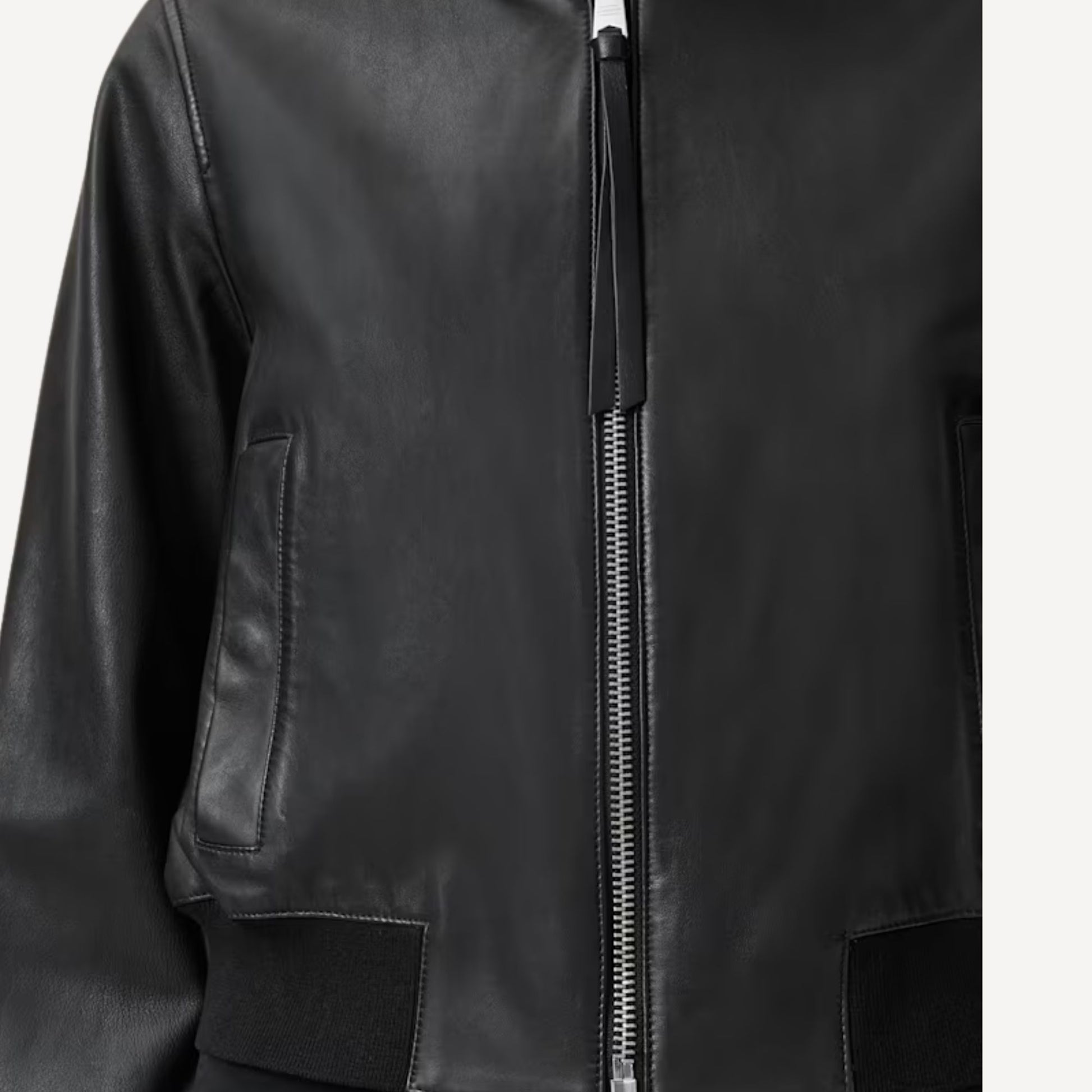 Ladies black leather bomber jacket for fashion and street style.