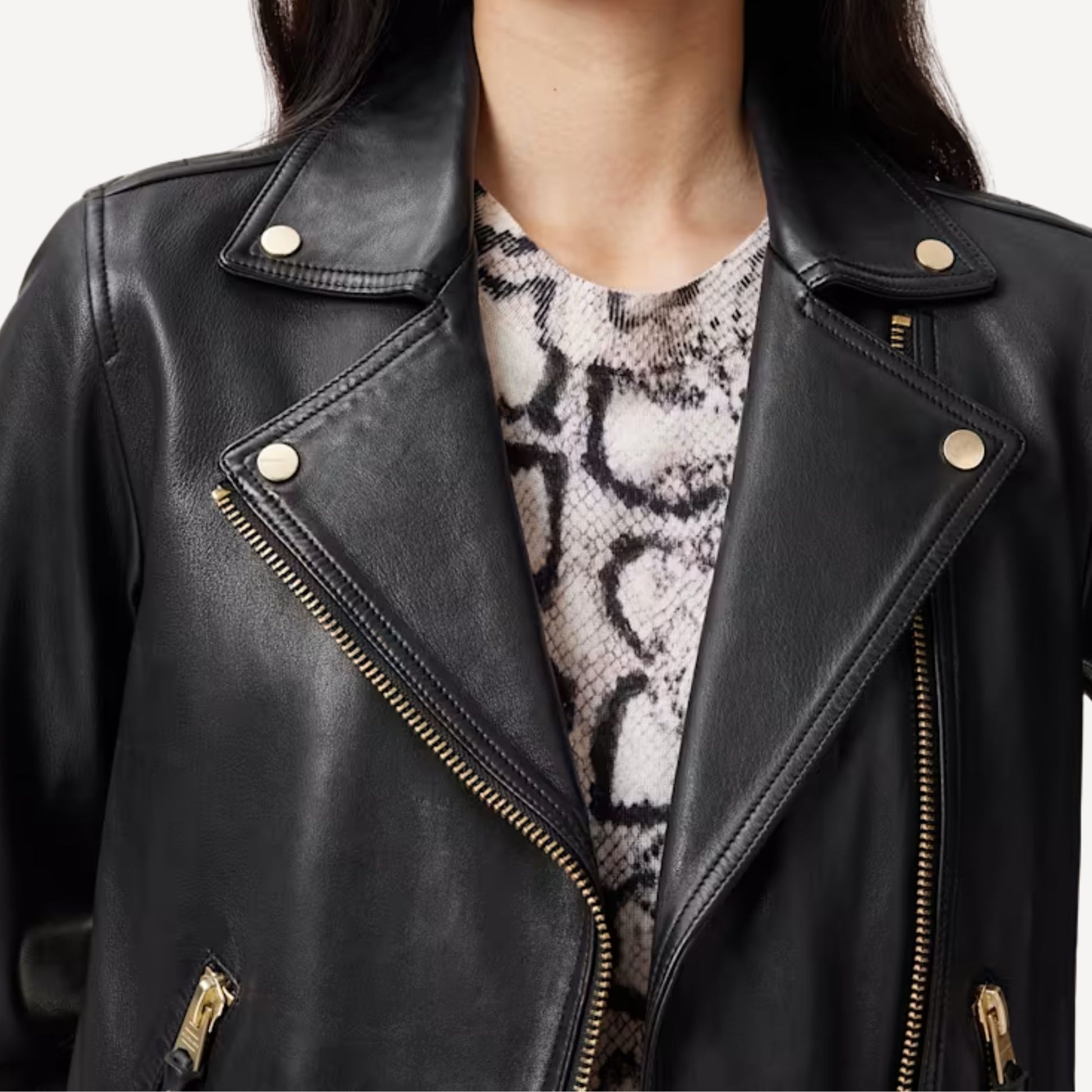 Ladies fashion black leather biker jacket for casual and evening wear.