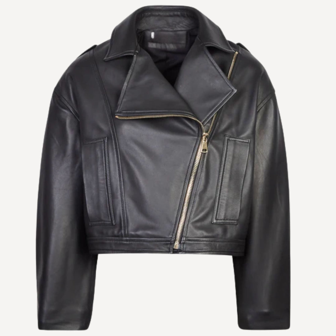 Women's premium oversized black leather biker jacket, front view, styled casually.